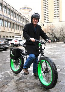 David Dodge on a Pedego electric bike.