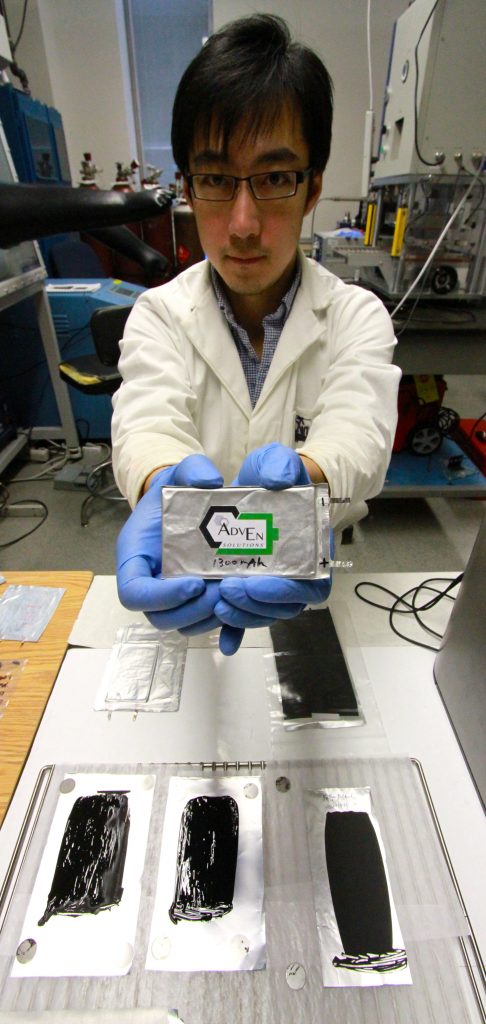 Xinwei Cui shows off one of the carbon nanotube components of the battery prototype at AdvEn Solutions.