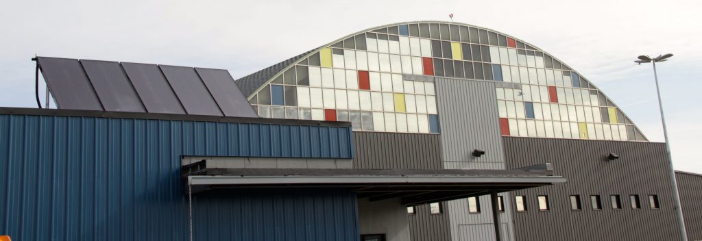 The solar thermal collectors on the roof of Terminal 4 at the Edmonton International Airport. Solar hot water systems tend to make more sense in applications that have large and constant demand for hotwater, such as an airport terminal or swimming pool. Dodge, Green Energy Futures