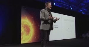 Elon Musk on stage presenting the Powerwall. Photo courtesy the <a href="https://www.flickr.com/photos/genphys/17127900677">General Physics Laboratory</a>