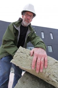 Peter Amerongen uses this Roxul mineral wool insulation along with hard form, spray-in and blow-in cellulose insulation to build homes with more than double the insulation of a conventional home allowing the home to be powered and heated by solar energy and reach the status of net-zero energy. Photo David Dodge, GreenEnergyFutures.ca