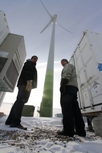 Charlie Delorme of Cowessess First Nation and Ryan Jansen of the Saskatchewan Research Council at the Cowessess wind energy storage project.