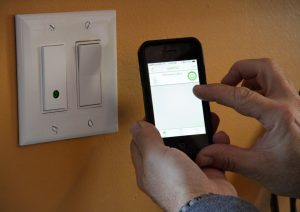 The Belkin WeMo programmable light switch combines home automation and smartphones and if used properly can save you a ton on energy use.