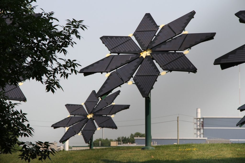 Solar flowers at Clarkson Wastewater Treatment Plant in the Region of Peel in Mississauga, Ontario. This flamboyant solar system is installed right next door to a former hybrid bus plant that also has a 427 kW solar system on it's roof. More than 23,000 renewable energy projects have been built in Ontario since the launch of the Green Energy Act in 2009. Photo David Dodge, Green EnergyFutures.ca