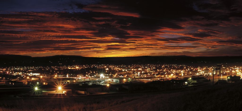 This image of Dawson Creek at night with the Bear Mountain Wind Park in the background was taken by photographer Don Pettit.