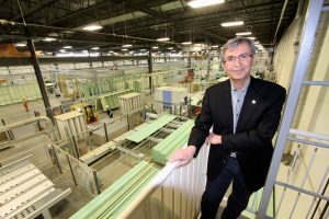 Reza Nasseri CEO of Landmark Homes in their manufacturing plant in Edmonton – they build energy efficient homes in their house factory in Edmonton. Photo David Dodge