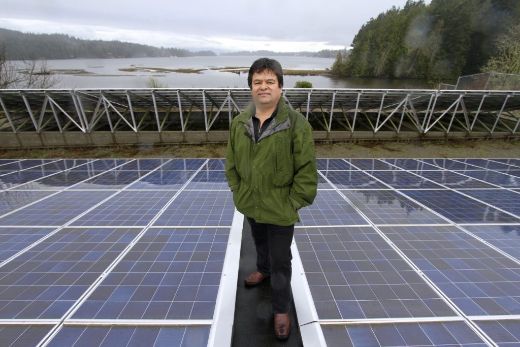 Chief Gordon Planes of the T'Sou-ke First Nation on the group's 62 kilowatt solar photovoltaic project.